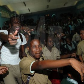 Ricardo Makyn/Staff Photographer.
Students of St. Jago High School revels in the vibes of The Gleaner 100 Champs Tour held at the school on Friday, February 26, 2010.