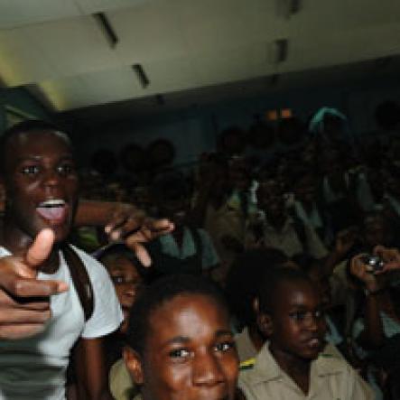 Ricardo Makyn/Staff Photographer.
Students of St. Jago High School revels in the vibes of The Gleaner 100 Champs Tour held at the school on Friday, February 26, 2010.