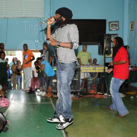 Ricardo Makyn/Staff Photographer.
Reggae artiste Ginjah (forground) shares the stage with fellow artiste Duane Stephenson at at The Gleaner Champs 100 Tour held at St. Jago High on Friday, February 26, 2010.
