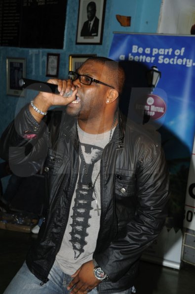 Ricardo Makyn/Staff Photographer.
Demarco 'bigging up' his 'True Friends' during his performance at The Gleaner Champs 100 Tour held at St. Jago High on Friday, February 26, 2010.