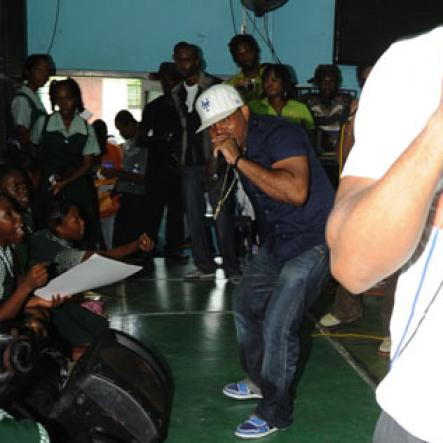 Ricardo Makyn/Staff Photographer.
Voicemail's Craig was making sure the St. Jago High students enjoyed the groups performance at The Gleaner Champs 100 Tour held at St. Jago High on Friday, February 26, 2010.