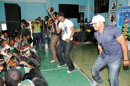 Ricardo Makyn/Staff Photographer.
                                                                                  Voicemail had the St Jago student body in a frenzy when they took the stage at the Gleaner's Champs 100 school tour at St Jago high school yesterday.