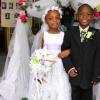 Anthony Minott/Freelance Photographer
NEWLY WEDS:  Bride Moya Green and groom Javier Foster pose for a photo shoot after they got married during a role play of a wedding ceremony at the Bridgeport Infant school, in Portmore, St Catherine on Friday, November 13, 2009.