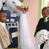 Anthony Minott/Freelance Photographer
Pastor Daniel Stephenson, marry bride, Moya Green and groom, Javier Foster  during a role play of a wedding ceremony at the Bridgeport Infant school, in Portmore, St Catherine on Friday, November 13, 2009.
