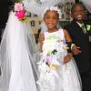 Anthony Minott/Freelance Photographer
NEWLY WEDS: Bride, Moya Green and her groom, Javier Foster pose for photos after they got married during a role play of a wedding ceremony at the Bridgeport Infant school, in Portmore, St Catherine on Friday, November 13, 2009.