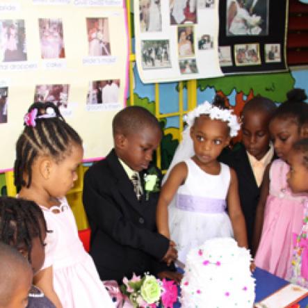 Anthony Minott/Freelance Photographer
Scenes during a role play of a wedding ceremony at the Bridgeport Infant school, in Portmore, St Catherine on Friday, November 13, 2009.