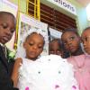 Anthony Minott/Freelance Photographer
The groom, Javier Foster, bride, Moya Green and others from the bridal party observe a cake during a role play of a wedding ceremony at the Bridgeport Infant school, in Portmore, St Catherine on Friday, November 13, 2009.