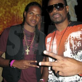 Trecia McGowan photo                                                                                                                          D-Major (right) and Jermaine Gonzales at Chris Martin Birthday Party at Fiction Night Club on Valentines Day.