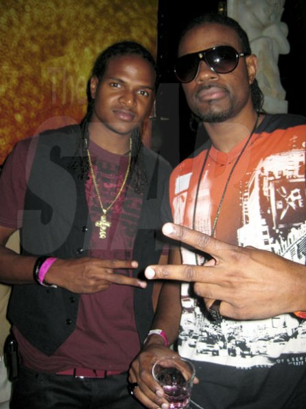 Trecia McGowan photo                                                                                                                          D-Major (right) and Jermaine Gonzales at Chris Martin Birthday Party at Fiction Night Club on Valentines Day.