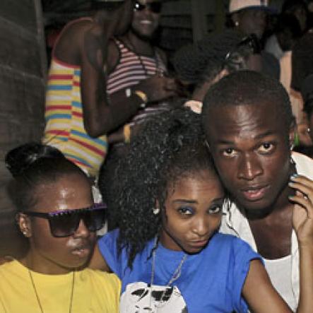 Anthony Minott/Freelance Photographer
A crew loving the moment during RumBar Chug it at Sugarman's Beach, Portmore, St Catherine, on Sunday, May 27, 2012.