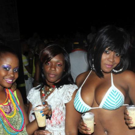 Anthony Minott/Freelance Photographer
 A girl crew strike a pose during Rumbar Chug it...Supremacy at Sugarman's Beach, Helllshire, Portmore, St Catherine on Sunday.