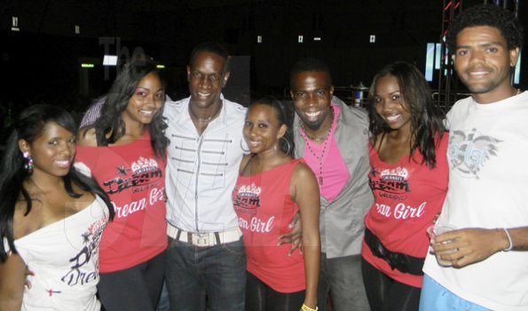 Contributed
YUSH - Dream Team Promoters from left: Philip Palmer, Jermaine Brown and Carlos Phillpotts are all smiles as they are surrounded by the Dream Girls at Yush held at the National Indoor Sports Centre.