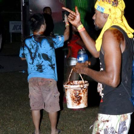 Winston Sill/Freelance Photographer
Sunset Cocoa J'ouvert, held at Hope Gardens, Old Hope Road on saturday night March 22, 2014.