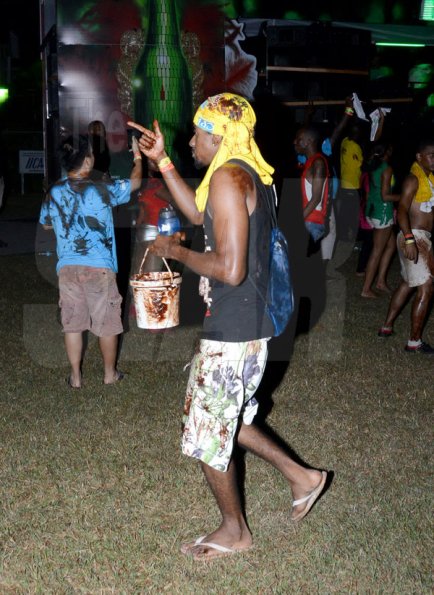 Winston Sill/Freelance Photographer
Sunset Cocoa J'ouvert, held at Hope Gardens, Old Hope Road on saturday night March 22, 2014.