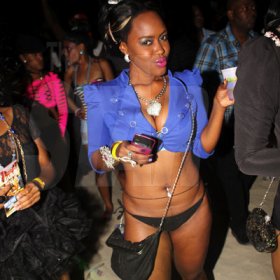 Anthony Minott/Freelance Photographer 
Nordia shows off a sexy pose as she enjoys the lime light during Container Beach Party at Waves Beach, Hellshire, Portmore St Catherine on Saturday, March 31, 2012.
