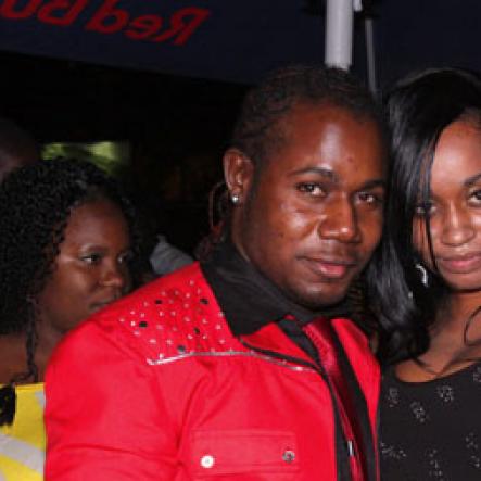Anthony Minott/Freelance Photographer
Container Boss, ian 'Don Ian' Miles pose beside a lady friend during Container Boss, Ian "Don Ian' Miles Birth night party at 2 Chelsea Avenue, New Kingston, Saturday, January 21, 2012.