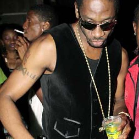 Anthony Minott/Freelance Photographer
Container boss, Ian 'Don Ian' Miles, who was celebrating his birthday pose with DJ Bounty Killer during Container Boss, Ian "Don Ian' Miles Birth night party at 2 Chelsea Avenue, New Kingston, Saturday, January 21, 2012.