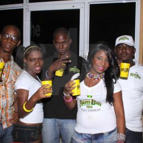 Anthony Minott/Freelance Photographer
The Rum Bar Rum girls, and the crew from Rum Bar Rum took a photo opt during Container Boss, Ian "Don Ian' Miles Birth night party at 2 Chelsea Avenue, New Kingston, Saturday, January 21, 2012.