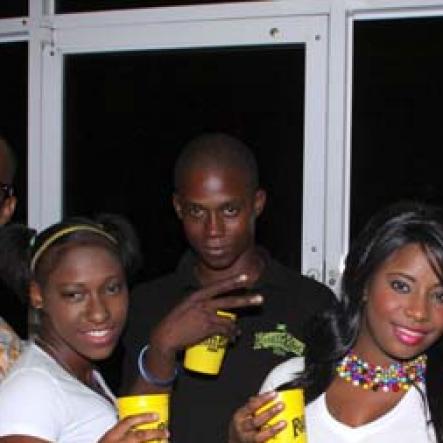 Anthony Minott/Freelance Photographer
The Rum Bar Rum girls, and the crew from Rum Bar Rum took a photo opt during Container Boss, Ian "Don Ian' Miles Birth night party at 2 Chelsea Avenue, New Kingston, Saturday, January 21, 2012.