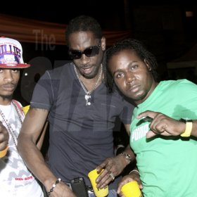 Anthony Minott/Freelance Photographer
DJ Bounty Killer (second left), pose alongside Container Satdayz promoter Don Ian (second right), and friends.