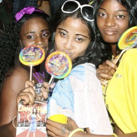 Anthony Minott/Freelance Photographer

These girls weren't afraid to show their affection for lollipops