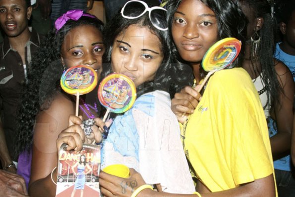 Anthony Minott/Freelance Photographer

These girls weren't afraid to show their affection for lollipops
