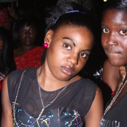 Anthony Minott/Freelance Photographer
Girls at Container Satdayz, the lollipop edition, held on Regent Street, Down Town, Kingston, on Saturday, Anthony Minott/Freelance Photographer DJ Bounty Killer (second left), pose alongside promoter, Don Ian (second right), and friends during Container Satdayz, the lollipop edition, held on Regent Street, Down Town, Kingston, on SaturdaY, November 12, 2011.