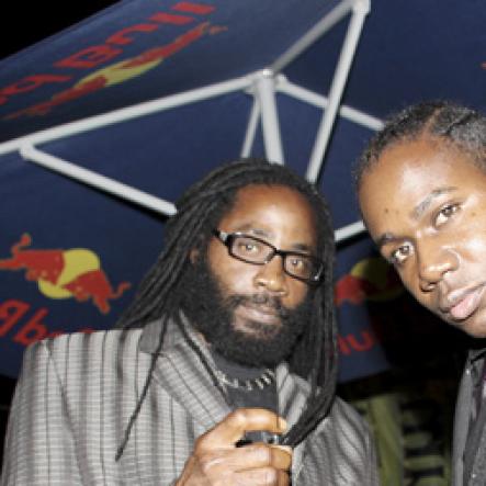 Anthony Minott/Freelance Photographer
Promoter, Don Ian (right), pose with a friend from his promotion crew during Container Satdayz Boat Ride edition, Caribbean Queen, 3 Port Royal Street, Down Town, Kingston, on Christmas Eve, Saturday, December 24, 2011.