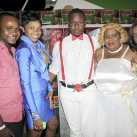 Anthony Minott/Freelance Photographer 
They were definitely dressed for the ocassion as they enjoy the vibe during Container Satdayz Boat Ride edition, Caribbean Queen, 3 Port Royal Street, Down Town, Kingston, on Christmas Eve, Saturday, December 24, 2011.
