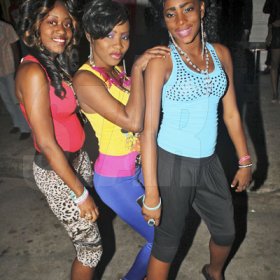 Anthony Minott/Freelance Photographer
the girls were out to party, here three divas show their 'style' during Container Satdaze, Recent Street, Denham Town, West Kingston, on Saturday, March 24, 2012.