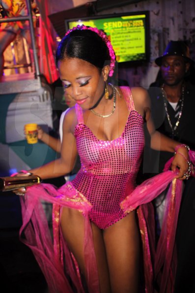 Anthony Minott/Freelance Photographer
This hot number shows her stylish outfit during Magnum Container Satdazs Anniversary party held at Regent Street, Denham Town, West Kingston on Saturday, October 27, 2012.