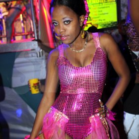 Anthony Minott/Freelance Photographer
This cutie shows off her stylish outfit  during Magnum Container Satdazs Anniversary party held at Regent Street, Denham Town, West Kingston on Saturday, October 27, 2012.
