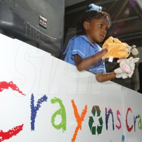 Gladstone Taylor / Photographer

Mishka Moncrieffe (elletson methodist early childhood) plays with two hand puppets from the crayons count learning lorry

an after school event for children from basic schools chosen by the national child month committee from downtown kignston. held at the Gleaner's parking lot along east street.