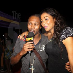 Anhony Minott/Freelance Photographer
D'Angel shares the video light with artiste Chosen during D'Angel birth night party atop the roof of Cookie's Night club, Portmore, St Catherine.