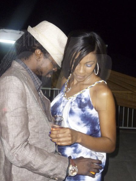 Photo bby Hasani Walters
Beenie Man has his moment with his wife, D'Angel, on her birthday.