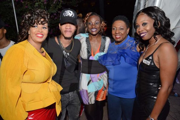 Rudolph Brown/PhotographerFrom left are Crystal Carby, Representative of Devon Biscuits, Dancer Chin, Jenny Jenny, Olivia Grange, Minister of Culture, Gender, Entertainment and Sport and Roxanne Brown, Brand Manager of Charles Chocolates at the Charles Chocolates Dancin' Dynamites 2019 Launch at Emancipation Park on Saturday January 5, 2018