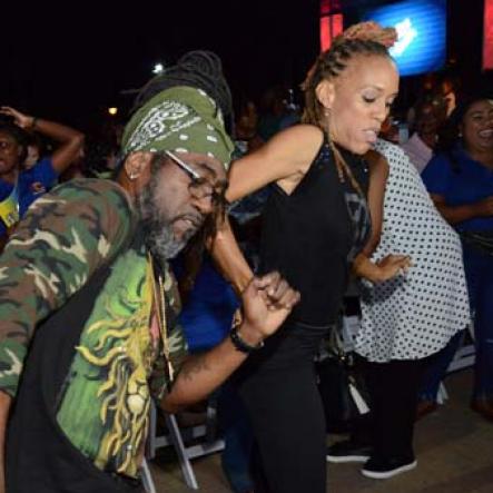 Rudolph Brown/PhotographerJudges Kerry-Ann Henry, (right) and Orville Hall, (centre) dancing at the Charles Chocolates Dancin' Dynamites 2019 Launch at Emancipation Park on Saturday January 5, 2018