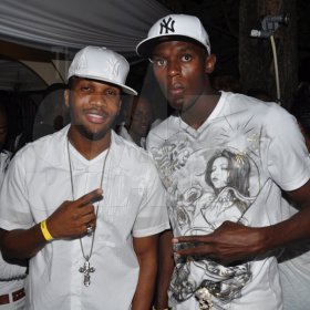 Contributed.

Assasin and Usain Bolt chill out at Daydreams held at the Solaris Estate in St Thomas recently.