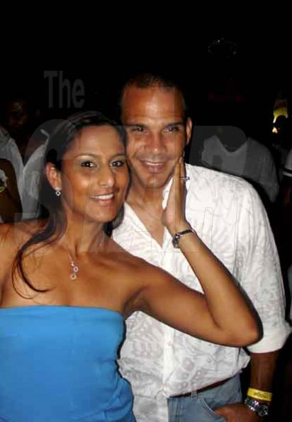Contributed
Saveeta Castro skipped the Daydreams all white theme but her husband Wilbur Castro doesnt seem to mind at all during 
Red Stripe Daydreams held at the Solaris Estate in St. Thomas on Sunday December 13, 2009.