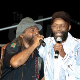 Winston Sill/Freelance Photographer
John Holt (left) and Beres Hammond pay their respects to Dennis Brown in song at Brown's 53rd birthday celebrations in downtown, Kingston on Sunday. Brown died in 1999. 






Dennis Brown Birthday Concert, held at "Big Yard", Orange Street, Kingston oin Sunday night January 31, 2010.