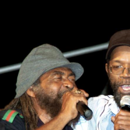 Winston Sill/Freelance Photographer
John Holt (left) and Beres Hammond pay their respects to Dennis Brown in song at Brown's 53rd birthday celebrations in downtown, Kingston on Sunday. Brown died in 1999. 






Dennis Brown Birthday Concert, held at "Big Yard", Orange Street, Kingston oin Sunday night January 31, 2010.