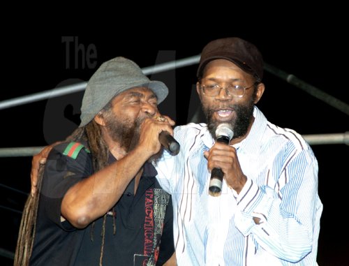 Winston Sill/Freelance Photographer
John Holt (left) and Beres Hammond pay their respects to Dennis Brown in song at Brown's 53rd birthday celebrations in downtown, Kingston on Sunday. Brown died in 1999. 






Dennis Brown Birthday Concert, held at "Big Yard", Orange Street, Kingston oin Sunday night January 31, 2010.