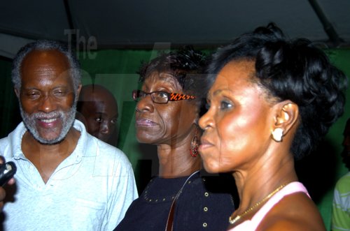 Winston Sill / Freelance Photographer
Dennis Brown Birthday Concert, held at "Big Yard", Orange Street, Kingston oin Sunday night January 31, 2010. Here are Herbie Miller (left), president, Jamaica Music Museum; Mary Brown (centre), Dennis sister; and Melody Royale (right), aunt.