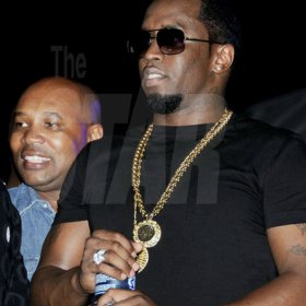 Winston Sill / Freelance Photographer
P Diddy and Supreme Promotions presents Sound Clash of four discos, dubbed "Bad Boys Clash", held at Lime Light Entertainment Complex, Hagley Park Road on Friday night January 4, 2013. Here rae Jomo Cato (left), of Red Stripe; and P Diddy.