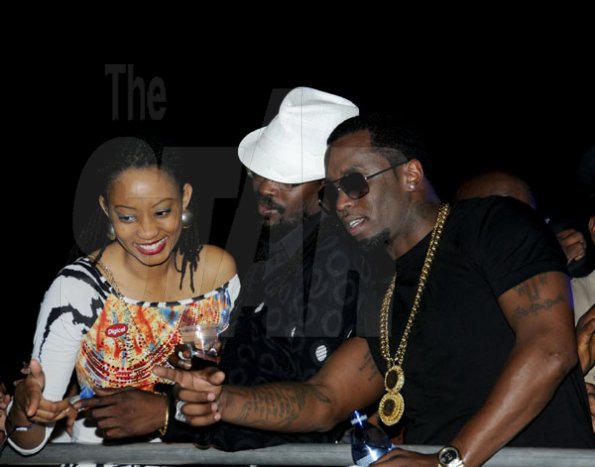 Winston Sill / Freelance Photographer
P Diddy and Supreme Promotions presents Sound Clash of four discos, dubbed "Bad Boys Clash", held at Lime Light Entertainment Complex, Hagley Park Road on Friday night January 4, 2013. Here are Tamiann Young, of Digicel; Beenie Man (centre); and P Diddy (right).