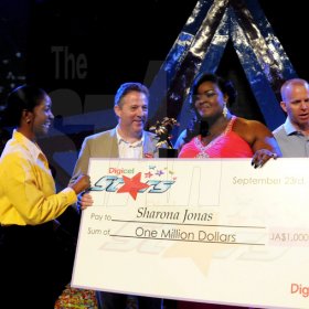Winston Sill / Freelance Photographer
Digicel Stars Final Show, held at the Courftleigh Auditorium. St. Lucia Avenue, New Kingston on Sunday night September 23, 2012. Here are Jackie Burrell-Clarke (left), of Digicel; Andy Thorburn (second left), CEO, Digicel Jamaica; the winner (second right); and Conor Looney (right), Marketing Director, Digicel.