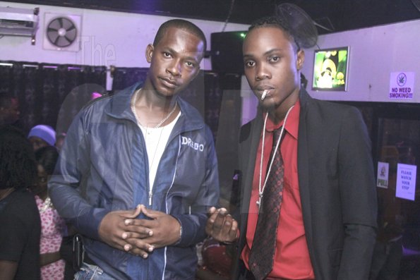 Anthony Minott/Freelance Photographer¶
¶DJ Marlon (right) and Diego pose for the camera during their birthday bash at the Club Impulse, New Kingston on Friday, July, 15, 2011.¶
¶