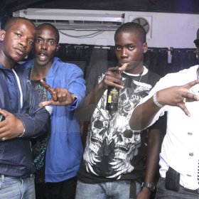 Anthony Minott/Freelance Photographer¶
DJ Diego (left), hangs out with firends ¶during DJ Marlon and Diego birthday bash at the Club Impulse, New Kingston on Friday, July, 15, 2011.¶
¶
