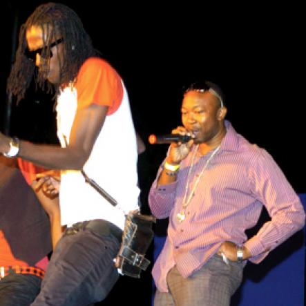 Winston Sill / Freelance Photographer
Dr Garth 'Shaka Pow' McDonald (second right) receives help from some dancers during his performance.






iThe Jamaica Cancer Society in Association with The Urological Society presents Doctors on Stage for Cancer, held on the Lawns of Jamaica Houe, Hope Road on Sunday night March 7, 2010.
