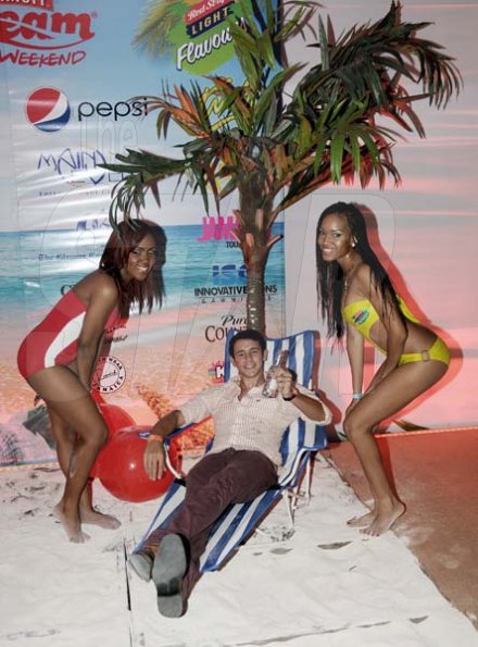 Winston Sill/Freelance Photographer
This lucky patron at the Smirnoff Dream Weekend launch party at Caymanas  Estate, St Catherine on Saturday was early to the beach with great company to boot.






 night June 29, 2013.